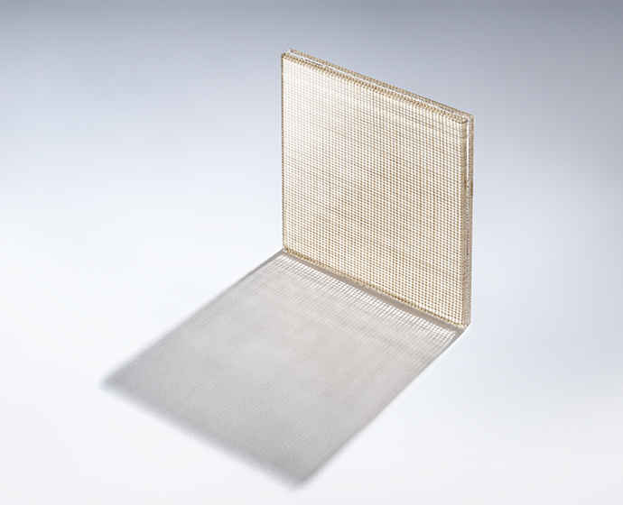 Light passing through laminated glass with fabric interlayer in GLAM Weave Beige creating soft shadow